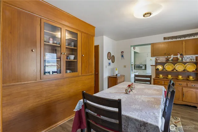 a view of a dining room with furniture window and outside view