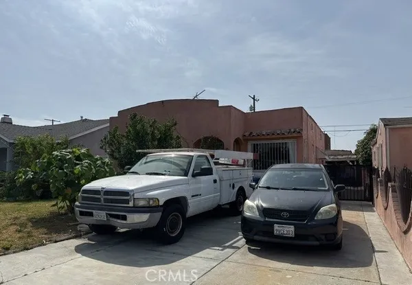 a car parked in front of a house