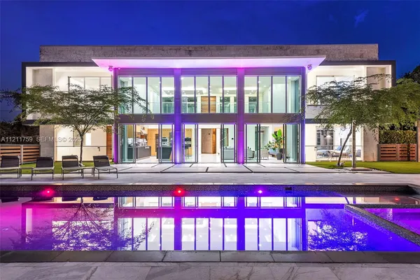 a front view of a house with swimming pool