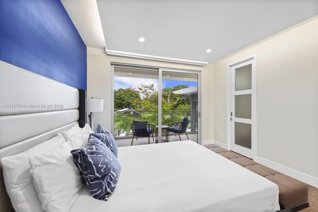 a view of a park with swings and slides