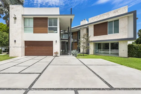 a aerial view of a house with a big yard