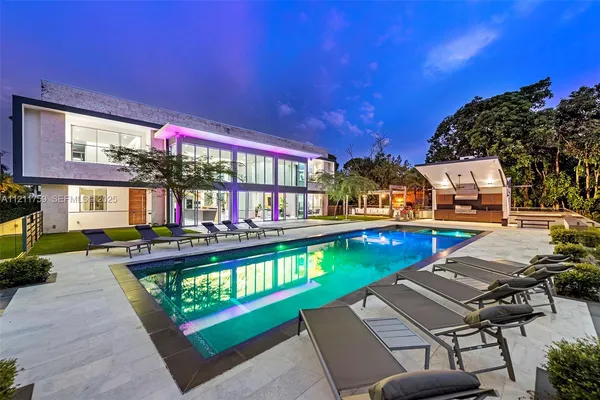 a view of a house with a big yard