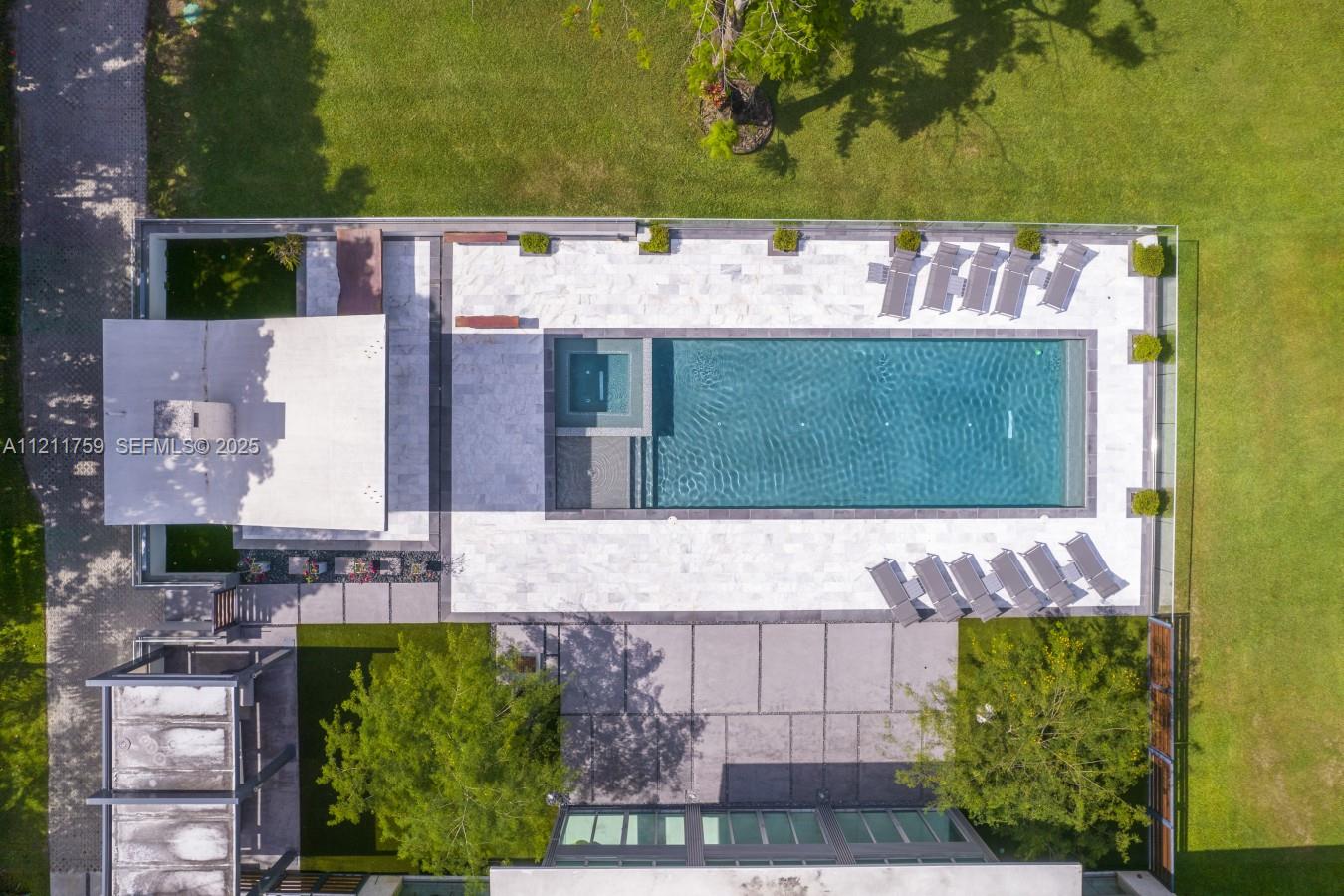 14305 Stirling Road Southwest Ranches, FL 33330 - Photo 60 of 66 a view of swimming pool with a yard