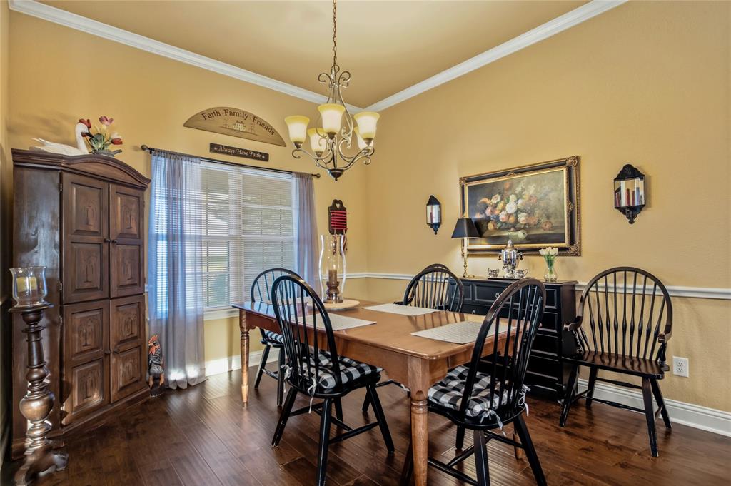 3911 Bennett Road Howe, TX 75459 - Photo 7 of 34 A nice formal dining area is the the left when you enter the home. It has a nice warmth about it that draws you into the area. The kitchen is to the right.