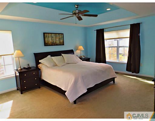 10 Carnation Road Monroe Township, NJ 08831 - Photo 10 of 25 a bedroom with bed and window