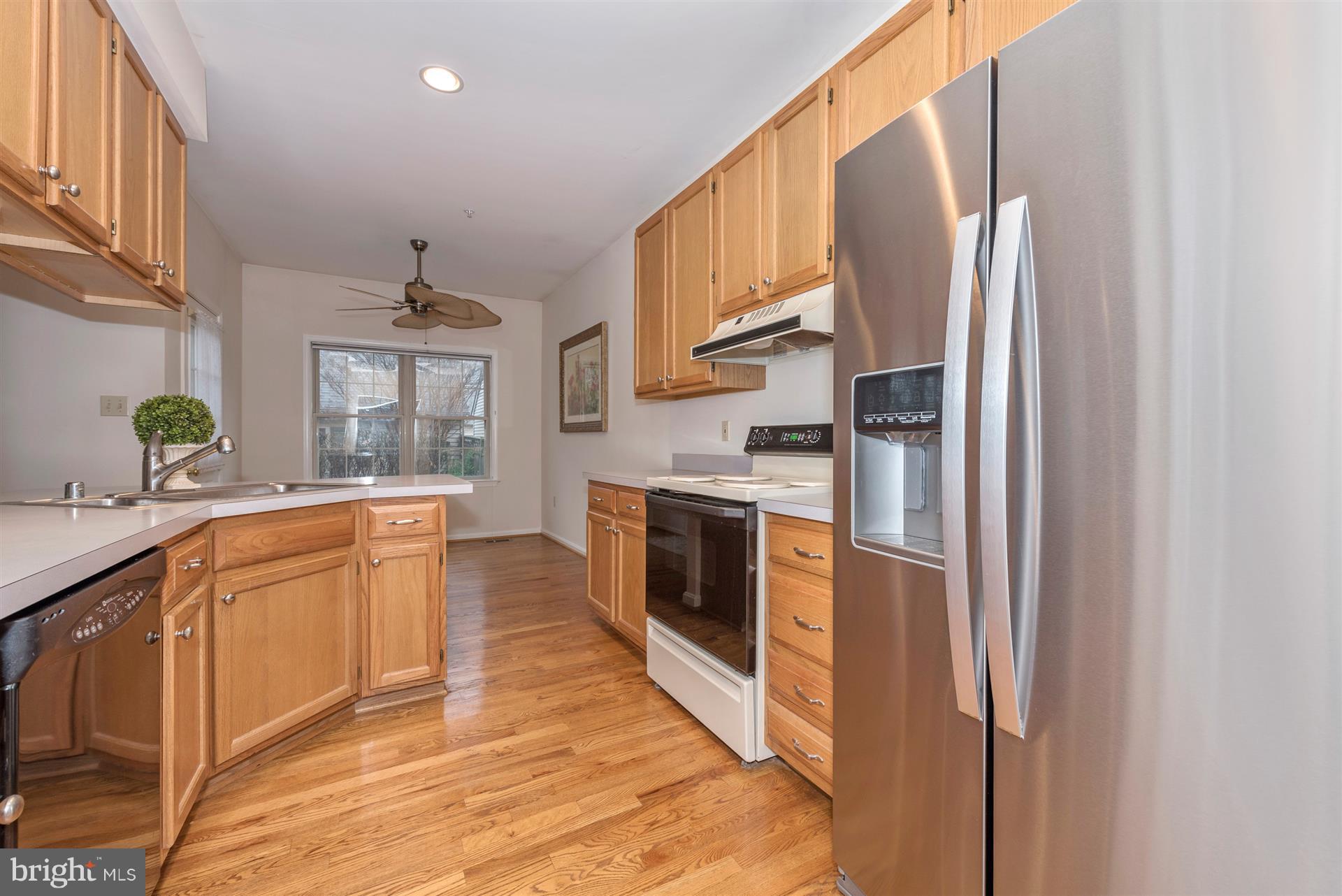 2426 Stoney Creek Road Frederick, MD 21701 - Photo 11 of 39 Hardwood flooring in kitchen as well!