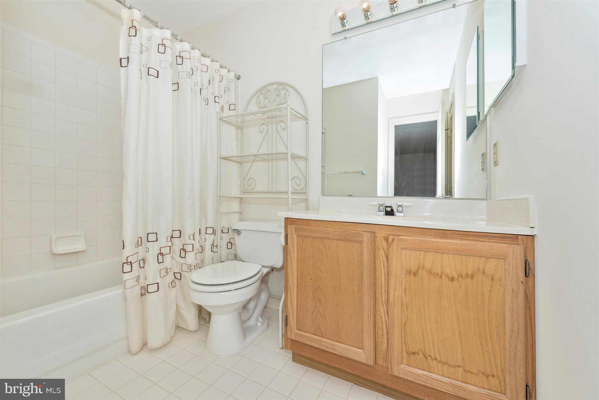 2426 Stoney Creek Road Frederick, MD 21701 - Photo 25 of 39 Hall bath with tile