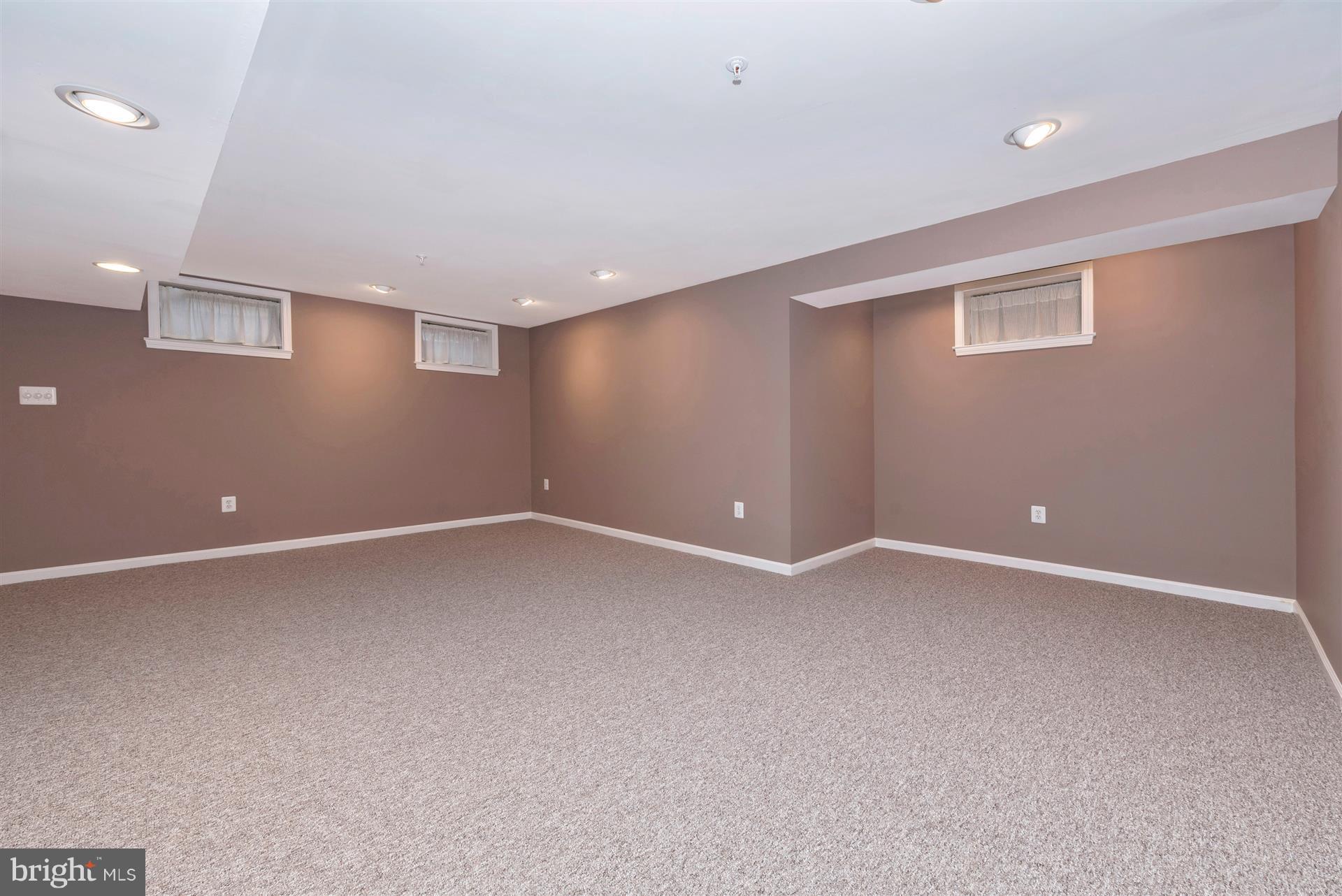 2426 Stoney Creek Road Frederick, MD 21701 - Photo 28 of 39 Windows and recessed lighting in rec room.