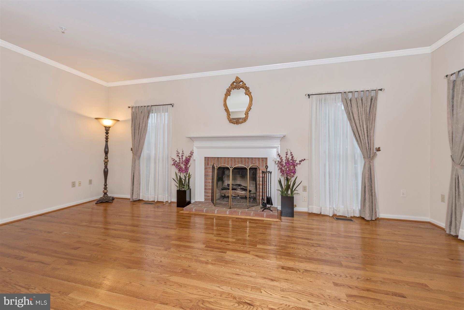 2426 Stoney Creek Road Frederick, MD 21701 - Photo 9 of 39 Gas fireplace with mantel for cozy evenings.