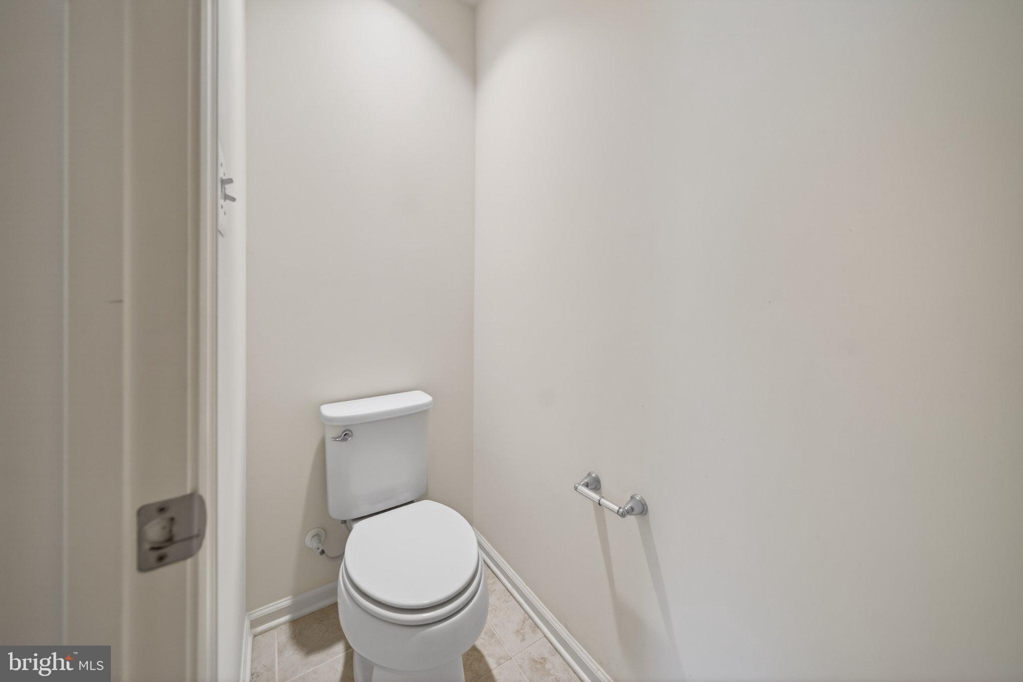 8475 Randell Ridge Road Frederick, MD 21704 - Photo 24 of 36 Sleek and modern powder room design.