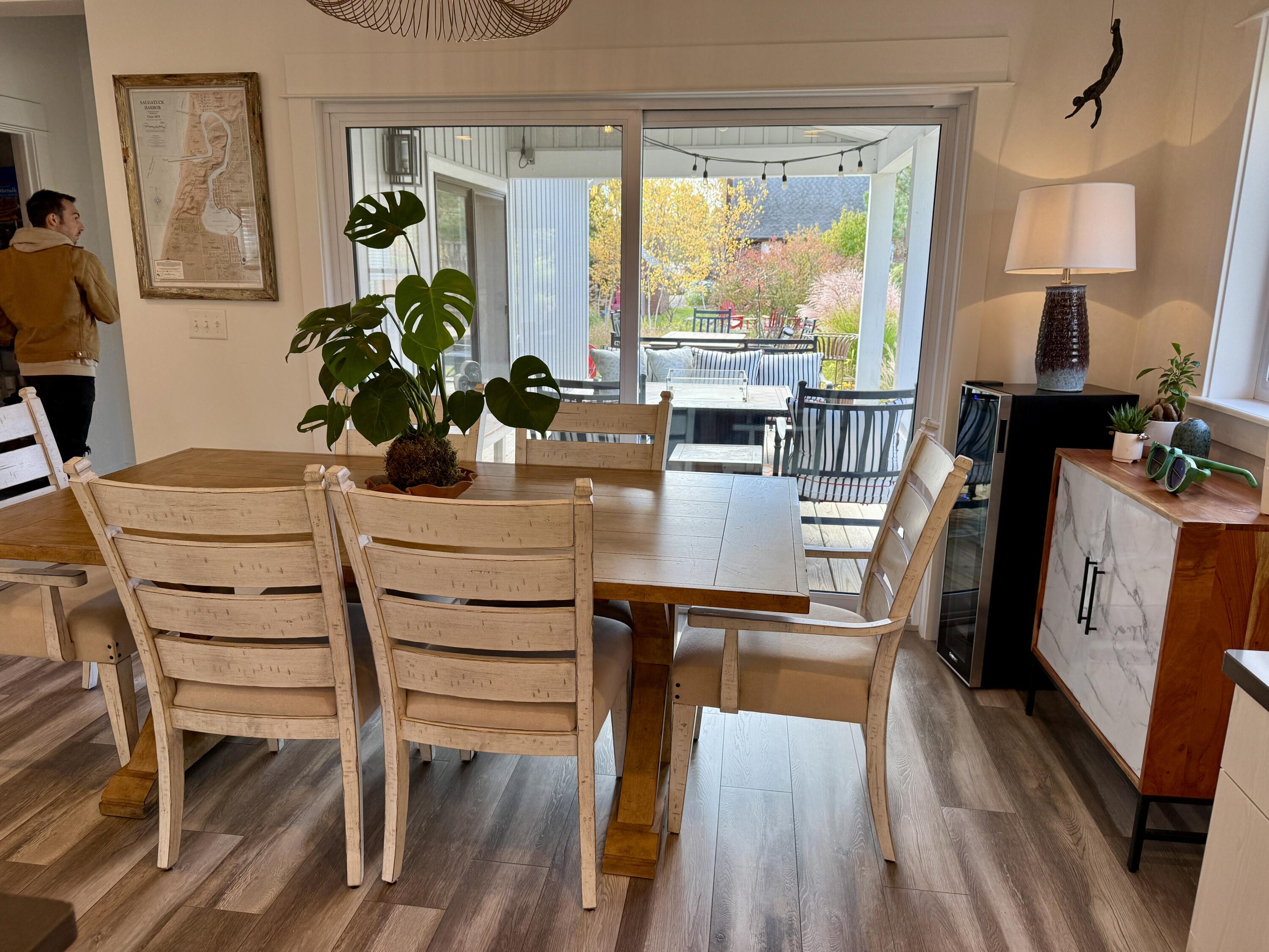 6910 3rd Street Douglas, MI 49406 - Photo 35 of 64 Dining area opens to the covered porch