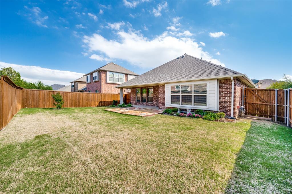 817 Lighthouse Lane Savannah, TX 76227 - Photo 20 of 20 a view of a house with a yard