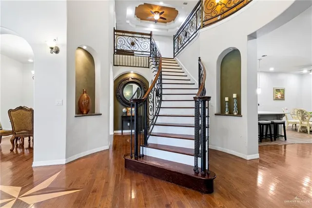 a view of entryway with wooden floor