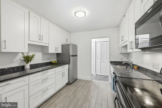 $315,000 | 2311 Pimmit Drive, Unit 105, Falls Church, VA 22043