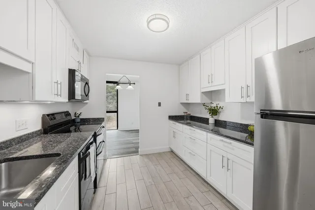 $315,000 | 2311 Pimmit Drive, Unit 105, Falls Church, VA 22043