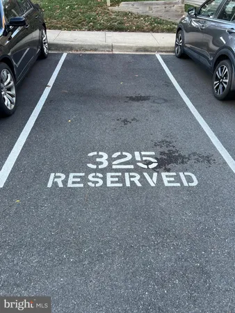 a view of a parking space and a street