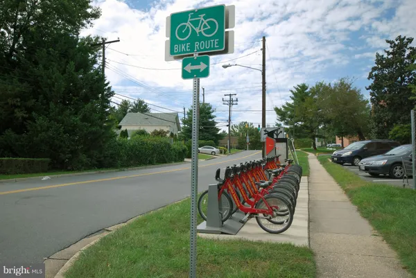 a view of a park with swings and slides