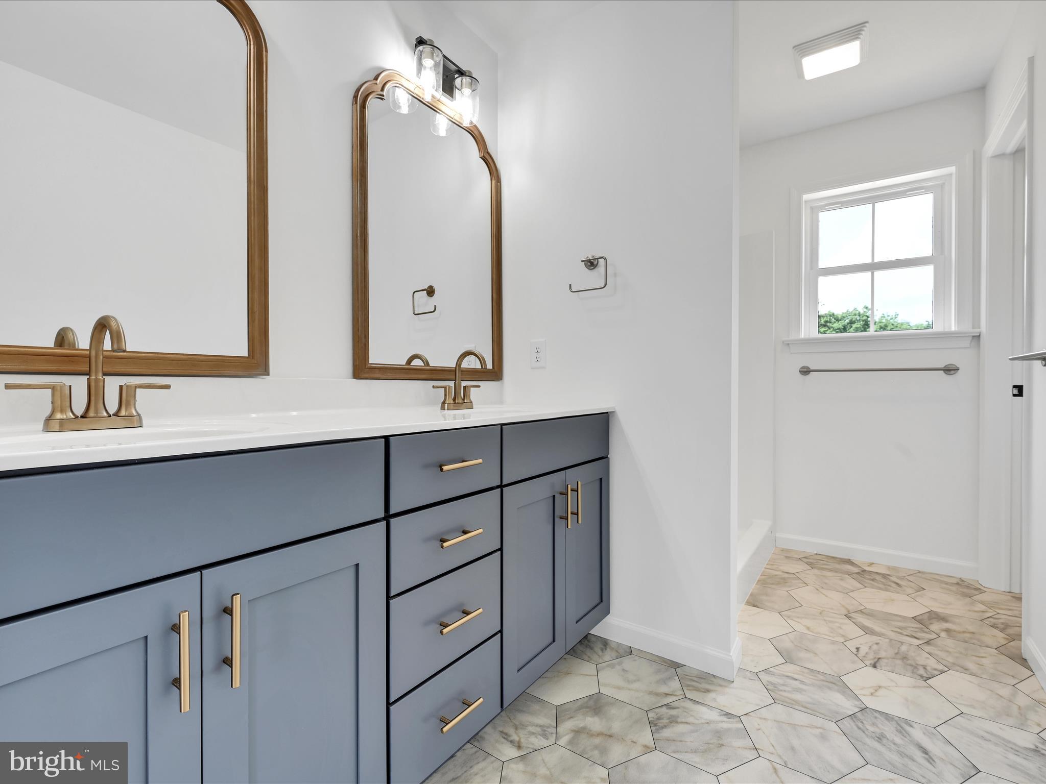 2 Stream Drive Carlisle, PA 17013 - Photo 5 of 6 a bathroom with a sink vanity and mirror