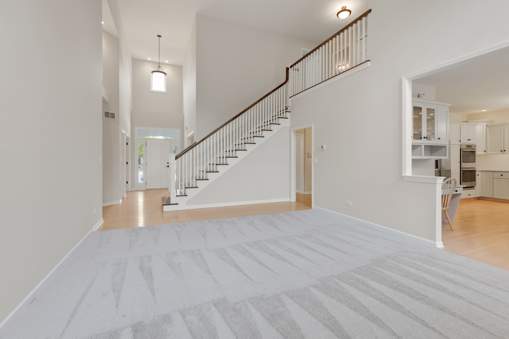 835 Longview Court Sugar Grove, IL 60554 - Photo 15 of 32 a view of an empty room with wooden floor