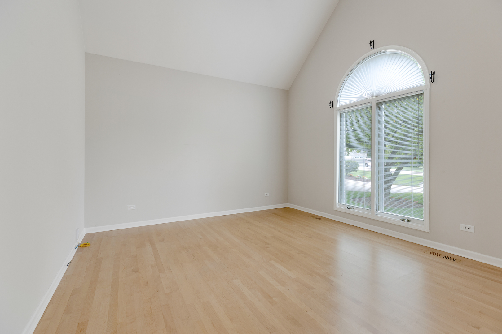 835 Longview Court Sugar Grove, IL 60554 - Photo 17 of 32 an empty room with wooden floor and windows