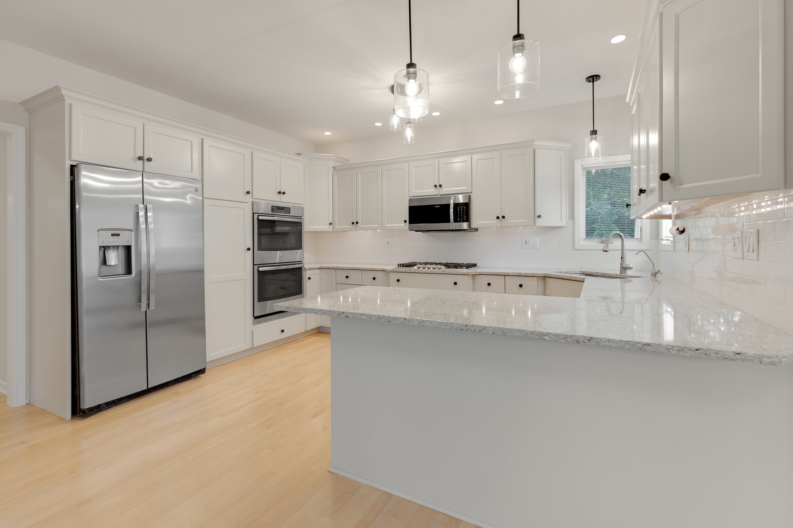 835 Longview Court Sugar Grove, IL 60554 - Photo 19 of 32 a large kitchen with cabinets and stainless steel appliances