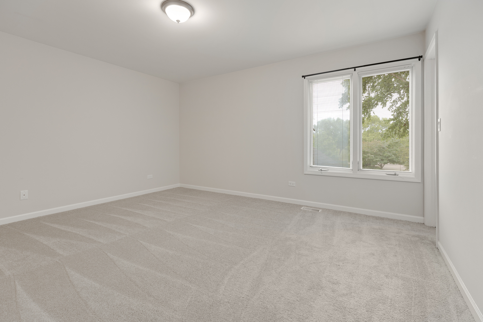 835 Longview Court Sugar Grove, IL 60554 - Photo 25 of 32 an empty room with a window