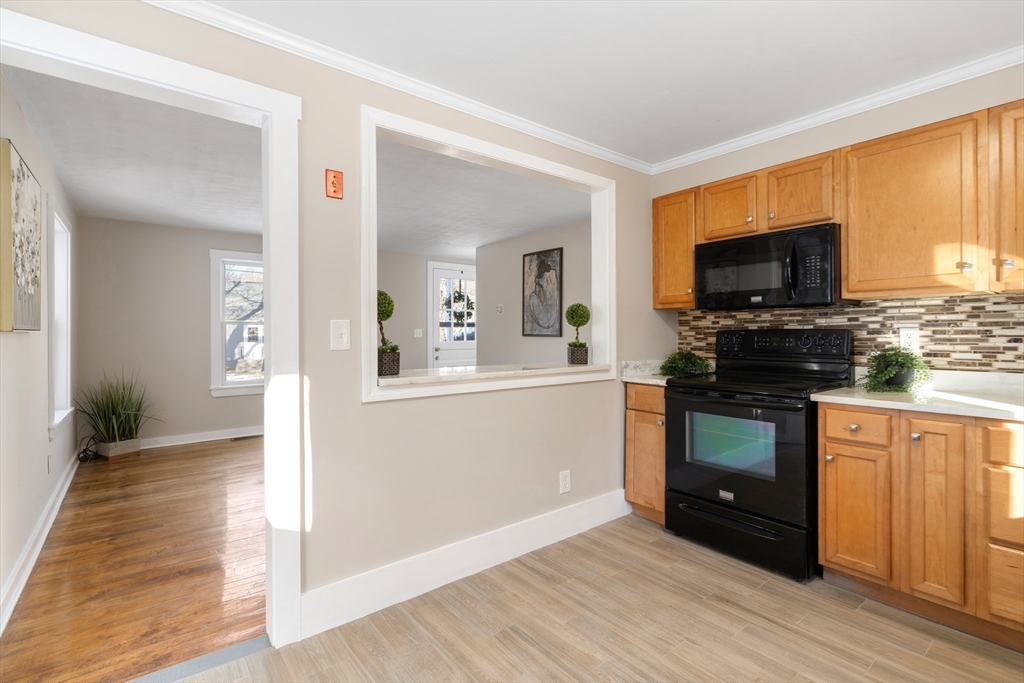 39 Highland Park Road Rutland, MA 01543 - Photo 8 of 30 a kitchen with granite countertop a stove top oven and sink