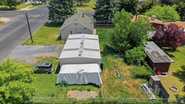 395 North 400 West Logan, UT 84321 - Photo 43 of 48 Expansive lot featuring a large outbuilding with a metal roof and a separate smaller shed