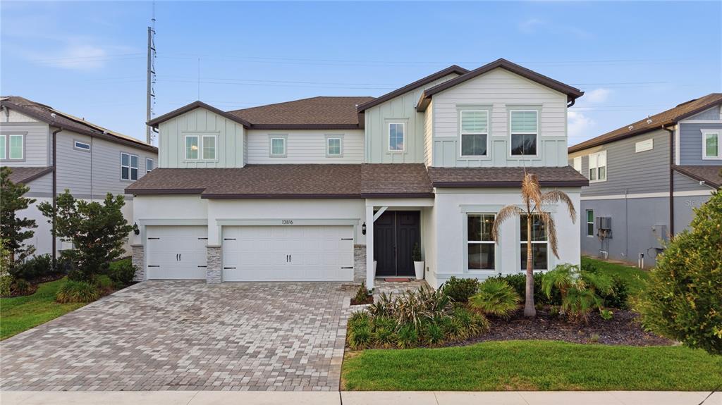 13816 Sharp Hawk Drive Riverview, FL 33569 - Photo 75 of 76 front view of a house with a yard