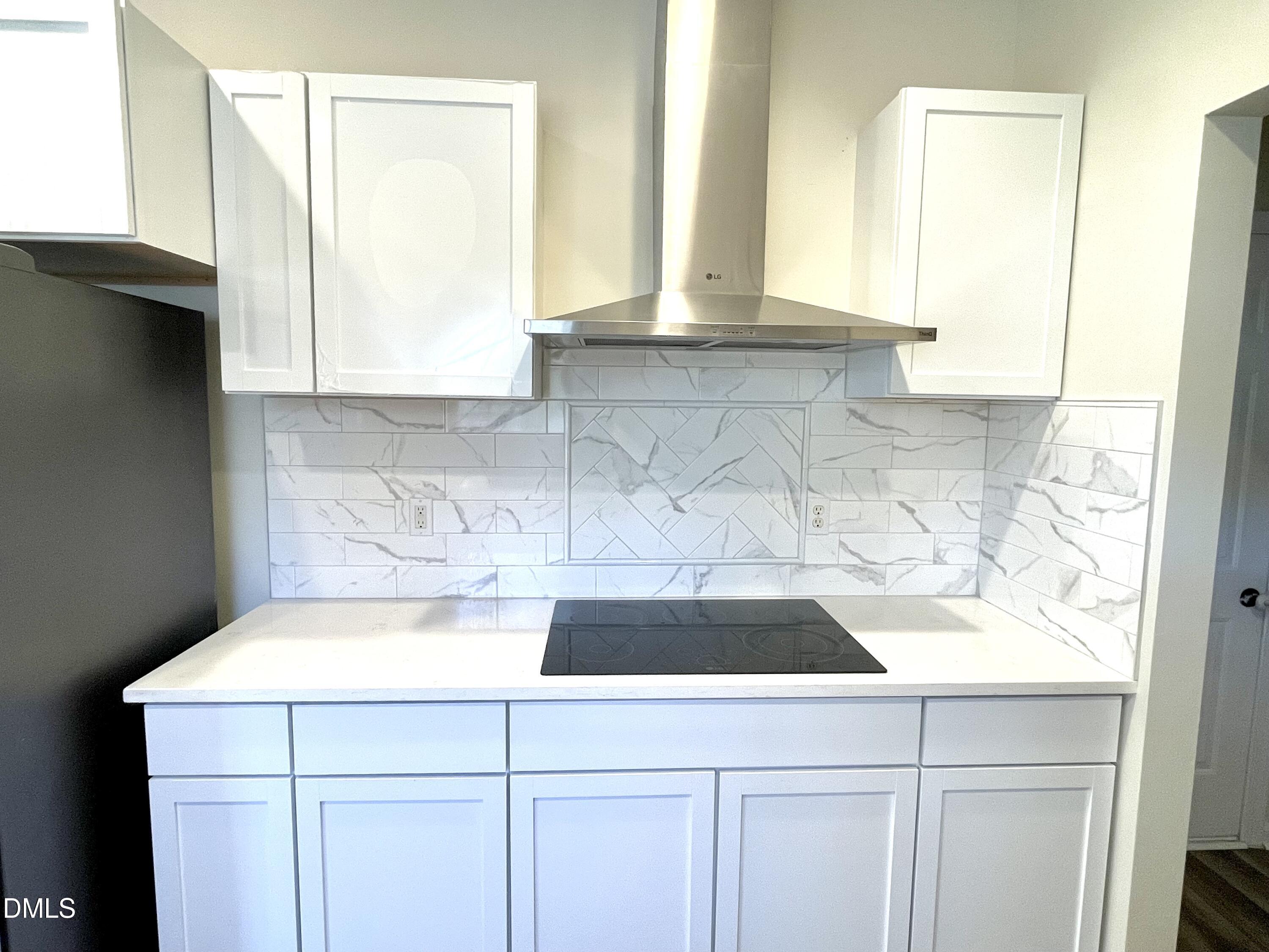 5506 Grand Mesa Drive Durham, NC 27713 - Photo 10 of 28 a close view of sink and cabinets