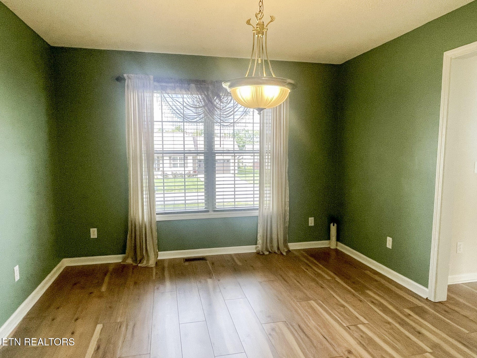 299 Jesse Loop Crossville, TN 38555 - Photo 11 of 32 a view of room with window and hardwood