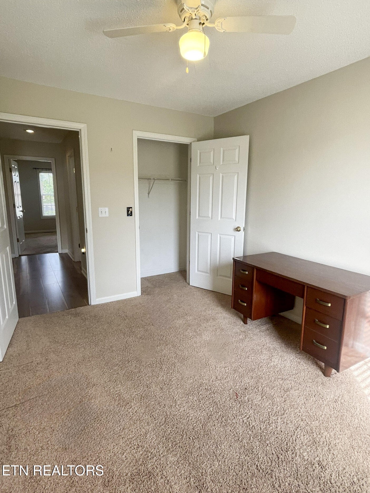 299 Jesse Loop Crossville, TN 38555 - Photo 15 of 32 a view of livingroom with furniture and chandelier fan