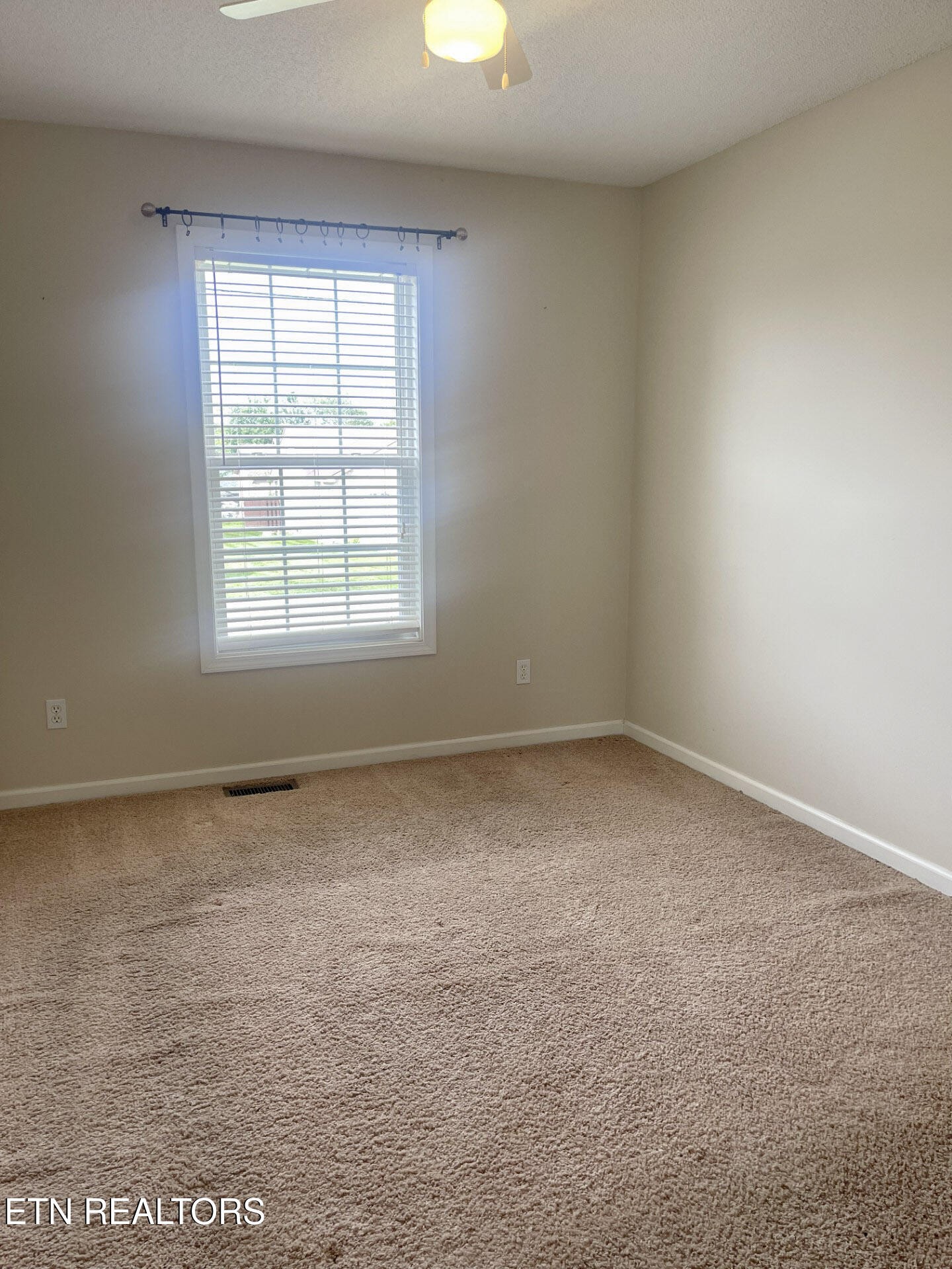 299 Jesse Loop Crossville, TN 38555 - Photo 19 of 32 an empty room with a window