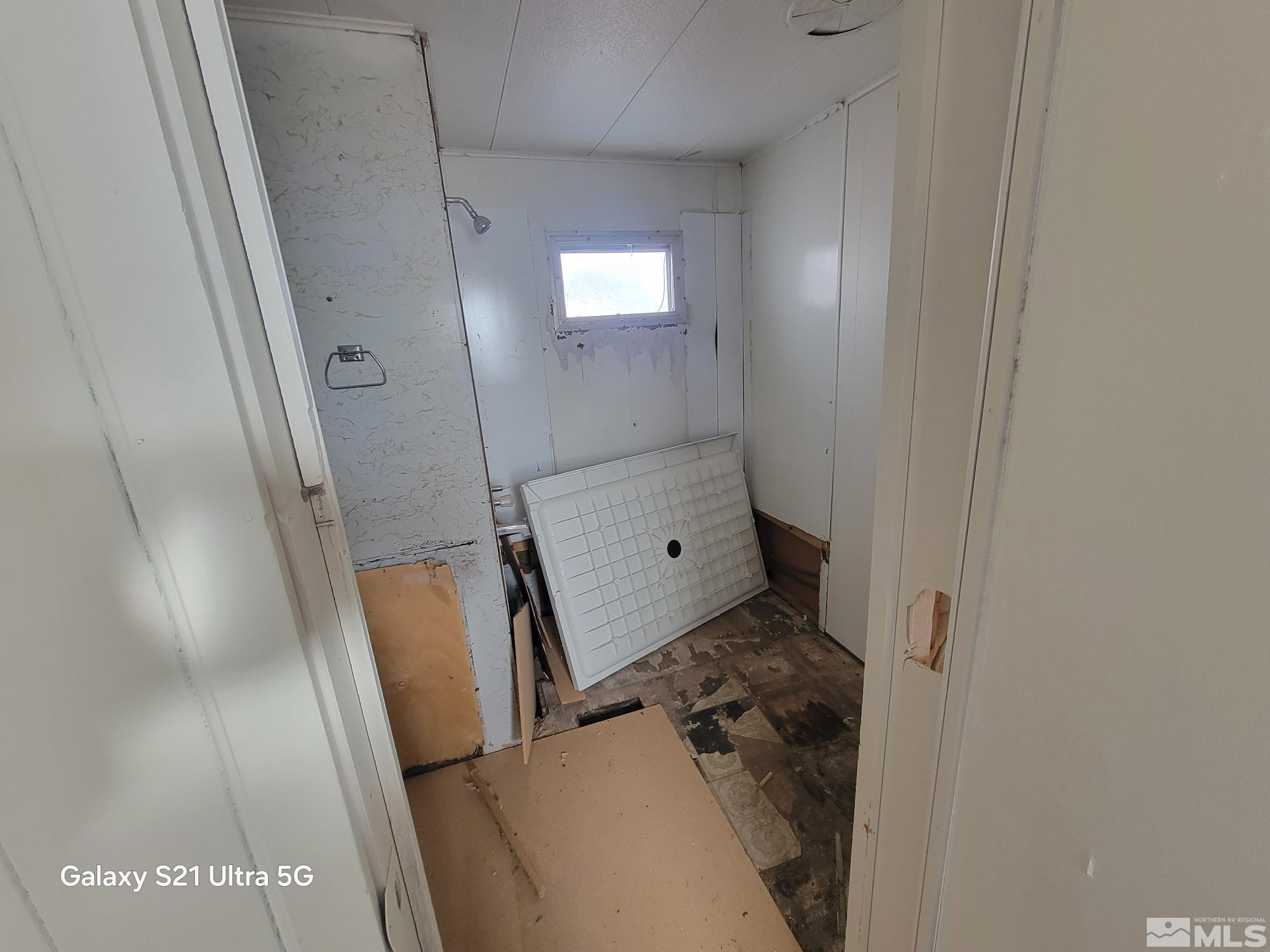 3205 Citrus Street Silver Springs, NV 89429 - Photo 6 of 15 a bathroom with a sink and mirror