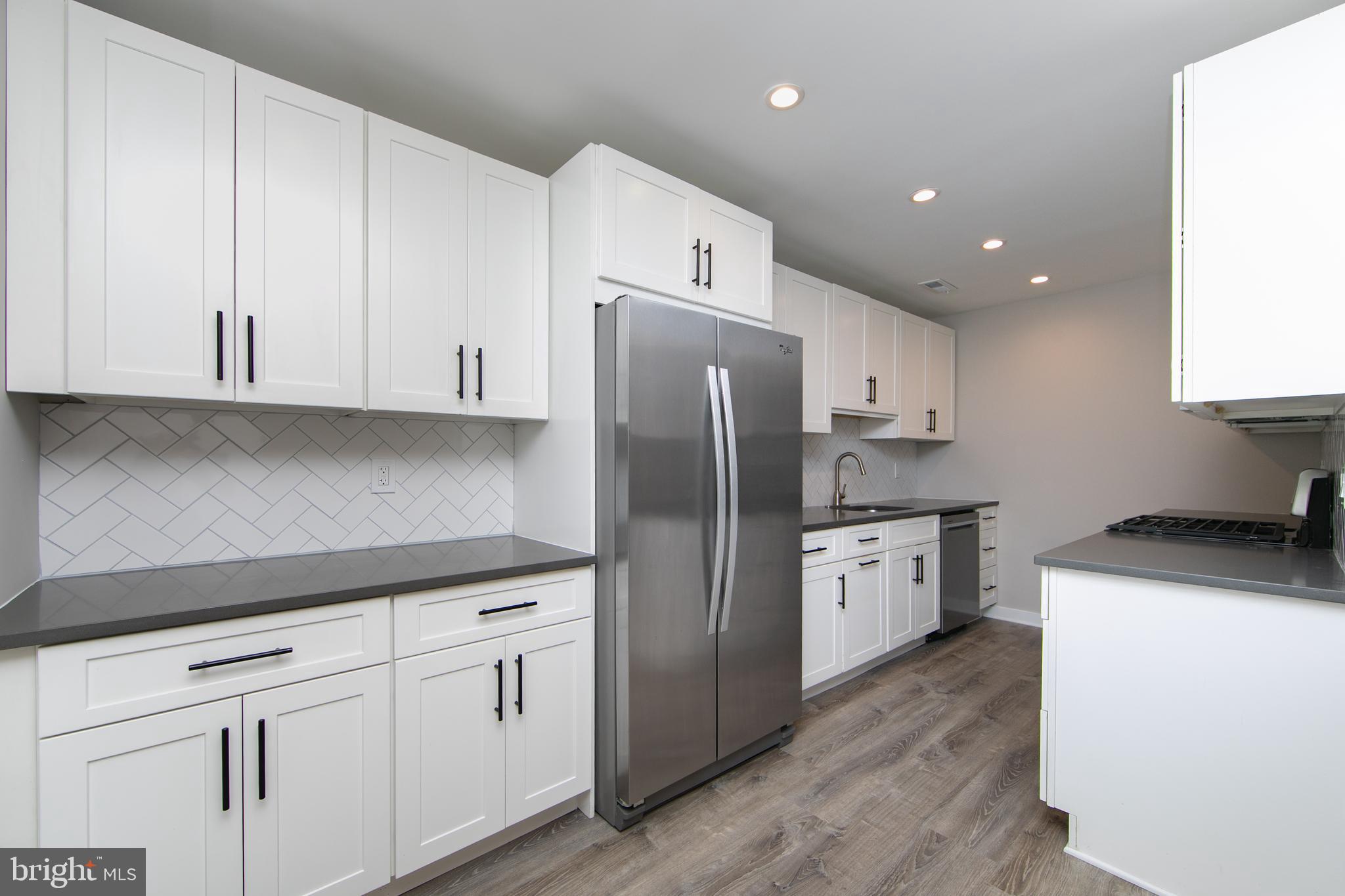306 Tavistock Road Cherry Hill, NJ 08034 - Photo 12 of 33 36 " White shaker cabinets with quartz counters