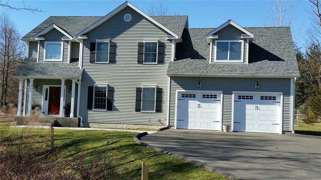 40 Chalon Road Trumbull, CT 06611 - Photo 1 of 1 a front view of a house with a yard