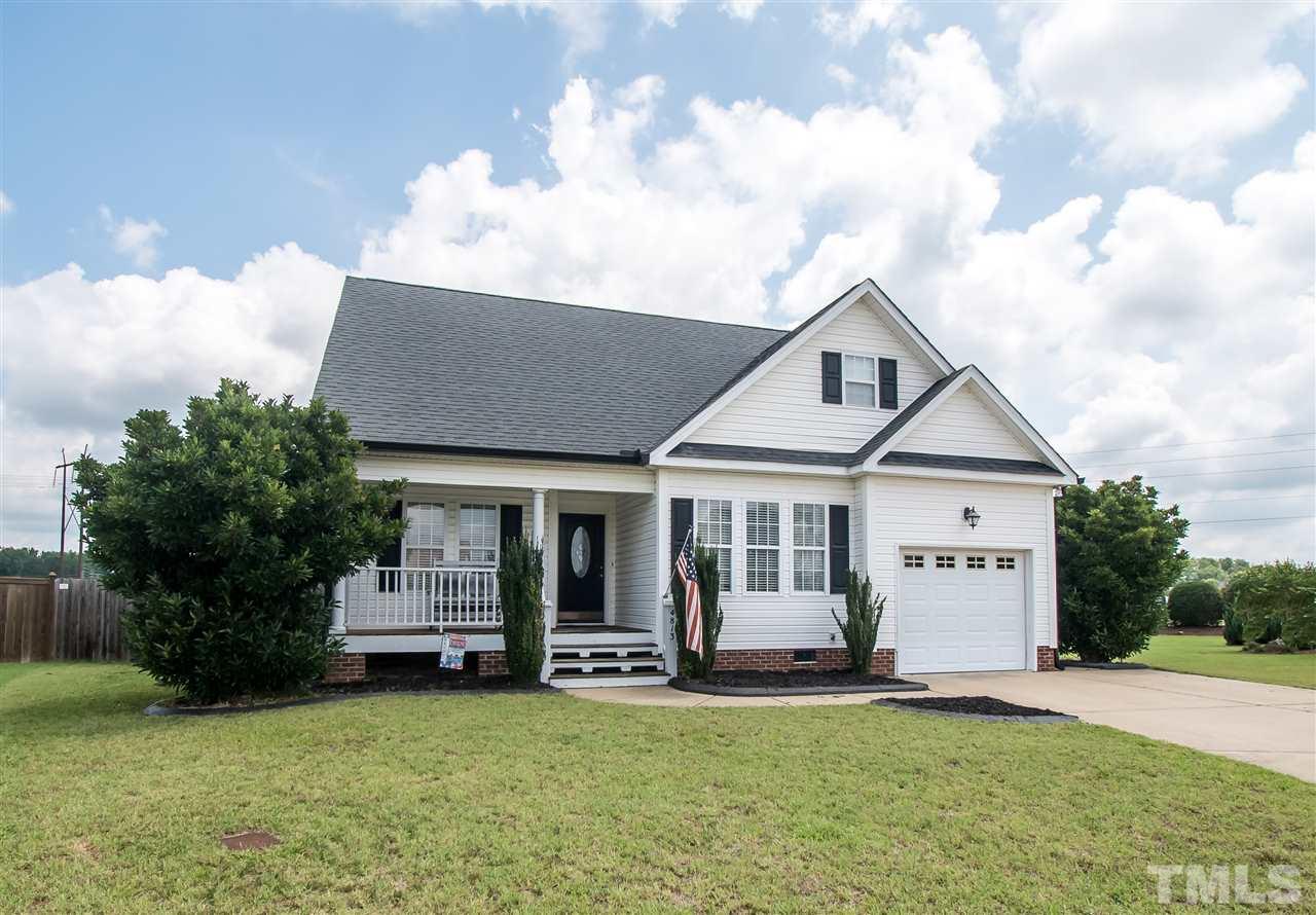 4813 Kure Road Raleigh, NC 27603 - Photo 1 of 25 a view of a house with backyard porch and garden