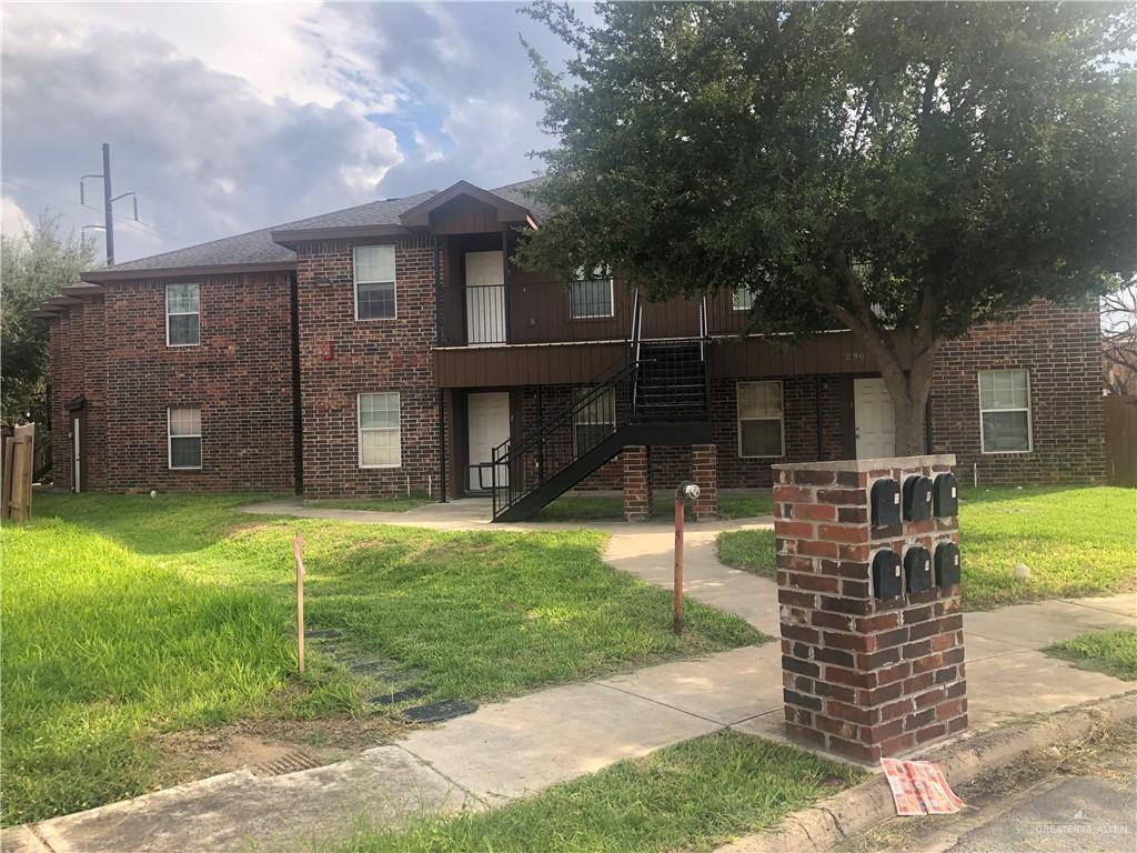 2901 Whitewing Avenue, Unit 6 McAllen, TX 78501 - Photo 1 of 3 a view of a house with a yard