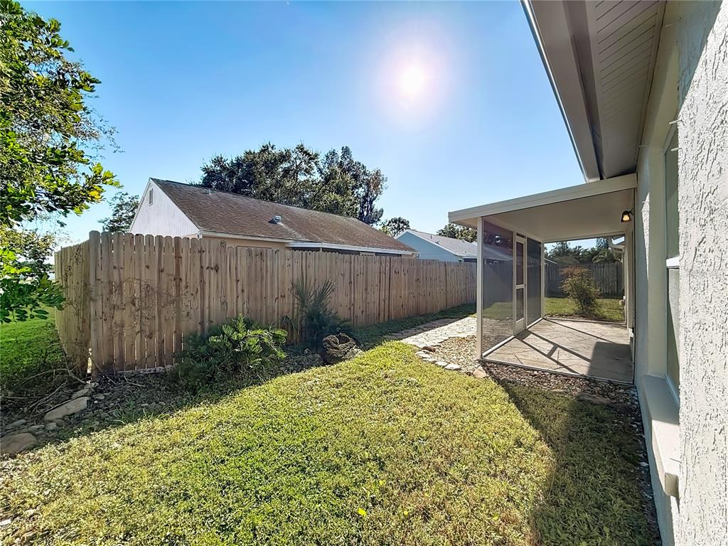 1909 Castle Bay Court Oldsmar, FL 34677 - Photo 39 of 48 a view of a backyard