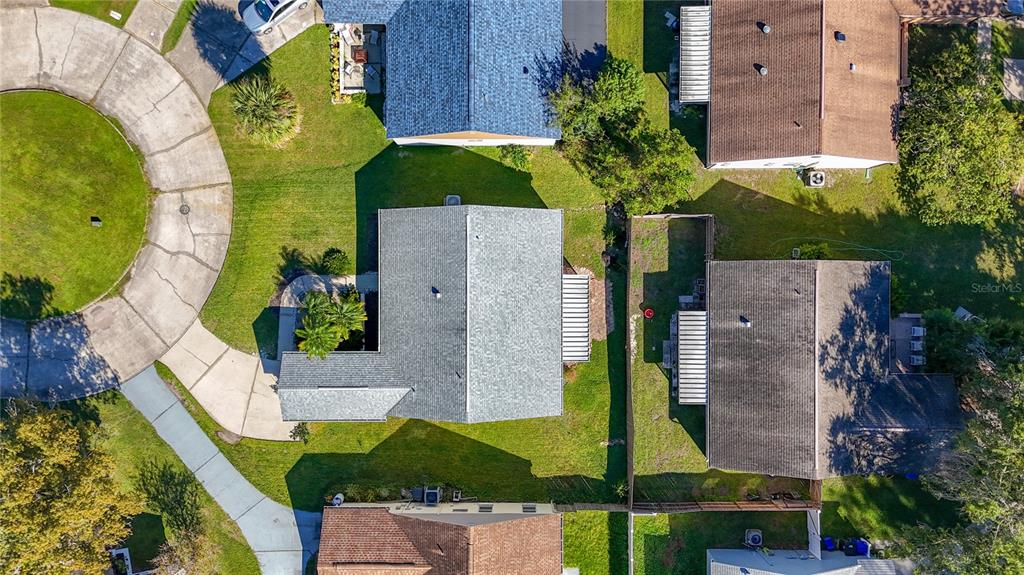 1909 Castle Bay Court Oldsmar, FL 34677 - Photo 48 of 48 an aerial view of a house with a garden