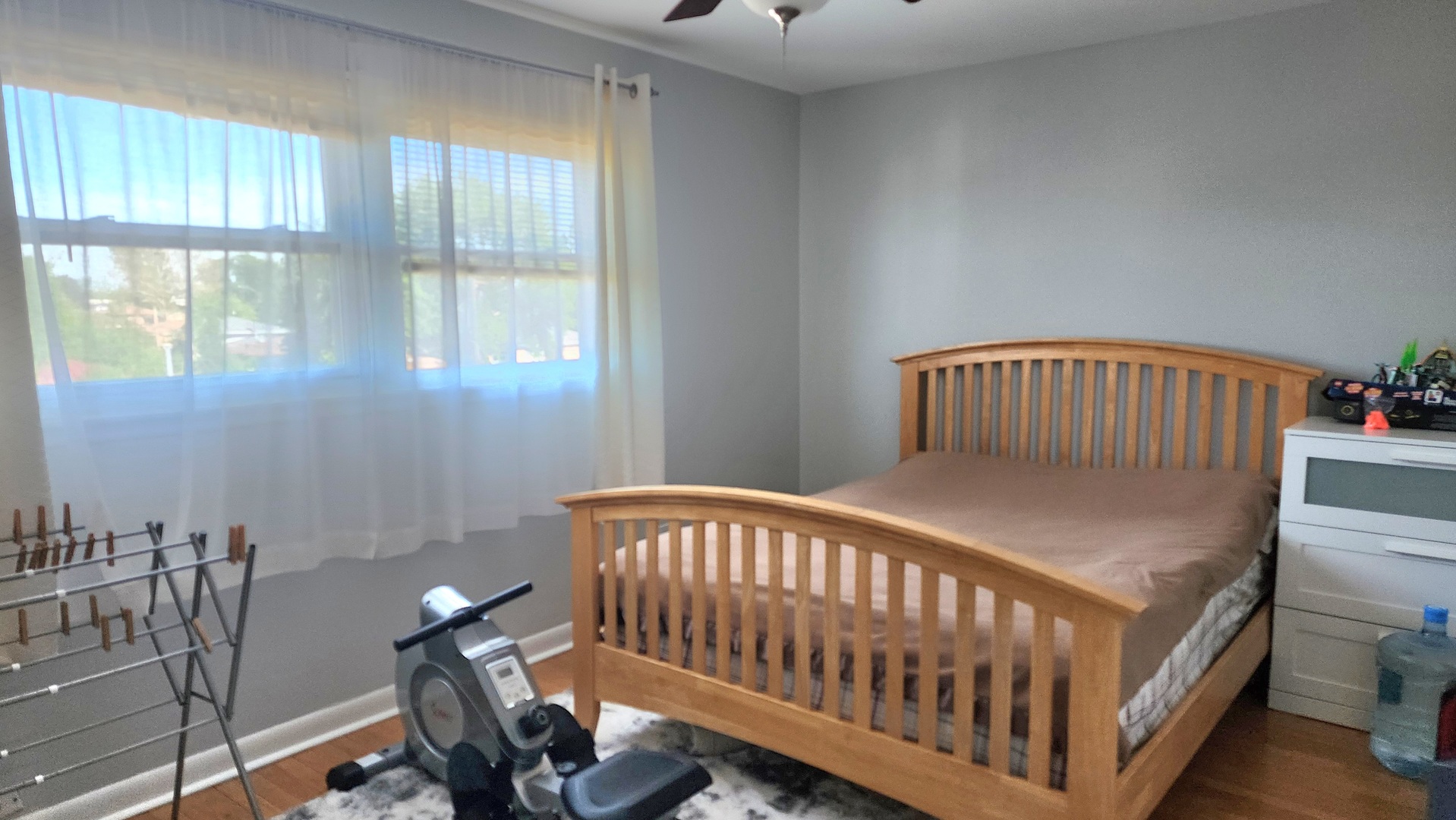 8125 South Roberts Road Bridgeview, IL 60455 - Photo 9 of 11 a bedroom with a bed and wooden floor