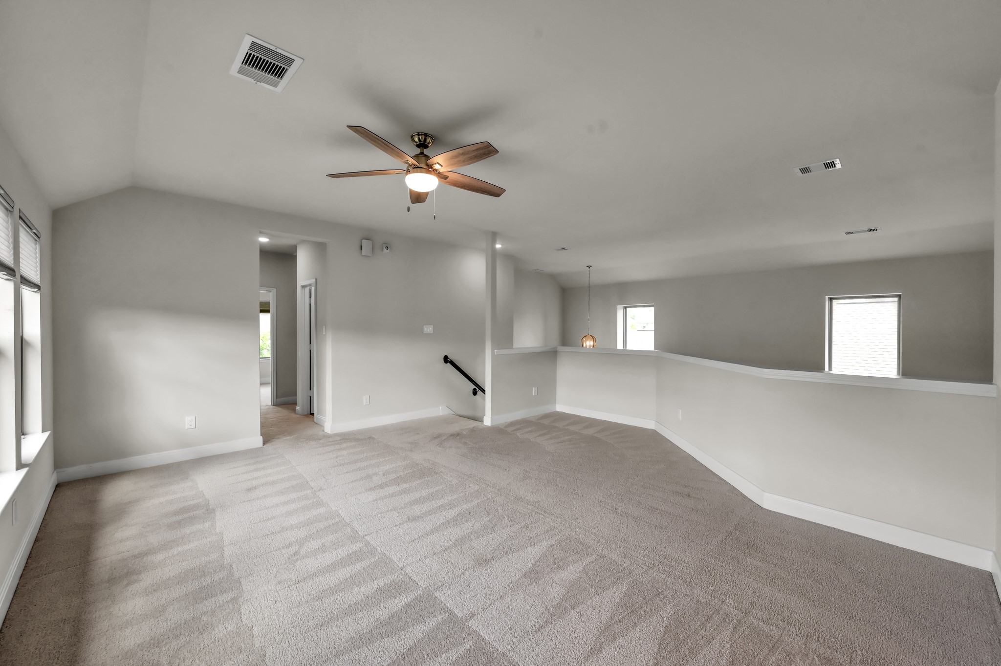 550 Chestnut Reef Court Conroe, TX 77304 - Photo 27 of 46 Additional view of the spacious upstairs game room, offering plenty of room for relaxing, play, and entertaining.