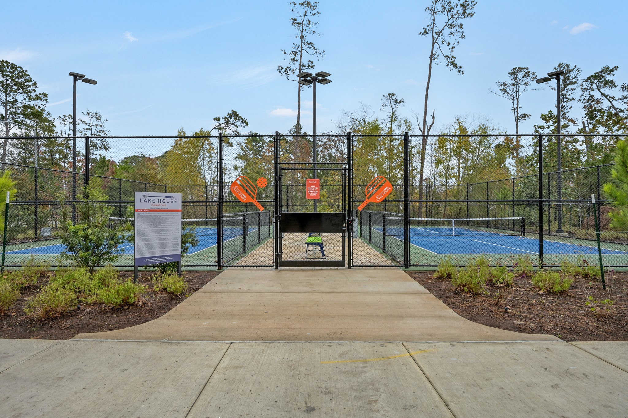 550 Chestnut Reef Court Conroe, TX 77304 - Photo 45 of 46 Community amenities including pickleball courts, basketball court and sand volleyball.