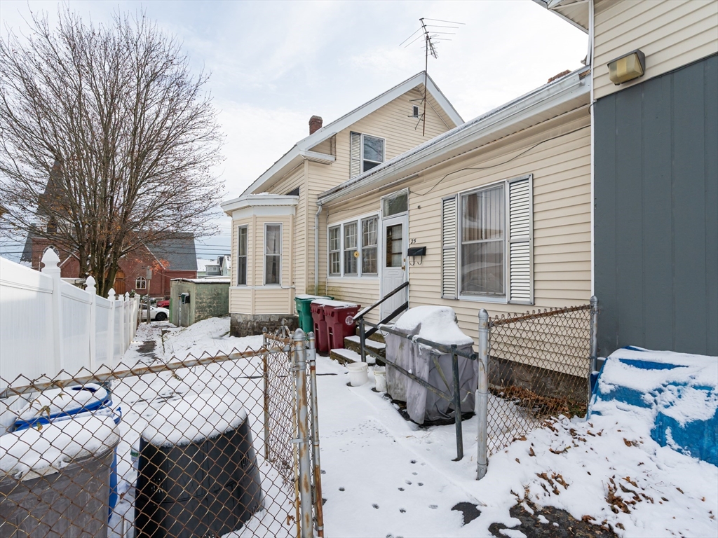 525 Chelmsford Street Lowell, MA 01851 - Photo 3 of 41 a view of a patio with couches chairs and potted plants