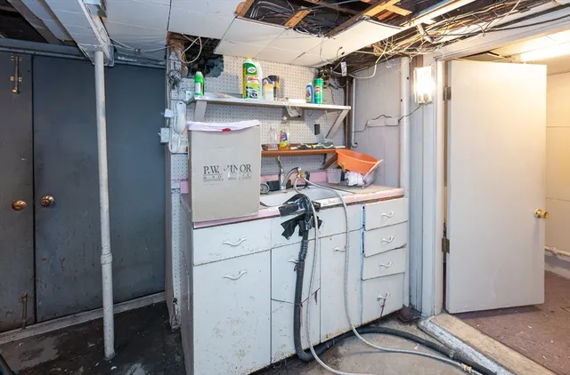a picture of a bathroom with a sink
