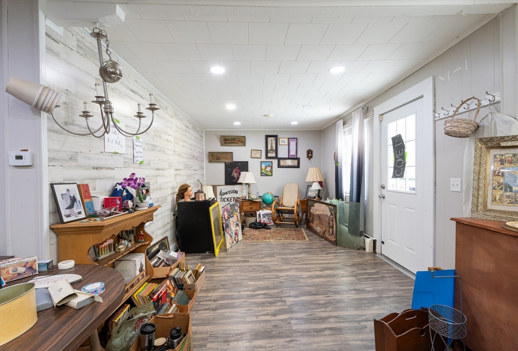 525 Chelmsford Street Lowell, MA 01851 - Photo 33 of 41 a living room with lots of furniture and wooden floor