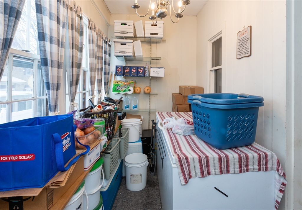 525 Chelmsford Street Lowell, MA 01851 - Photo 5 of 41 a living room with furniture and a window