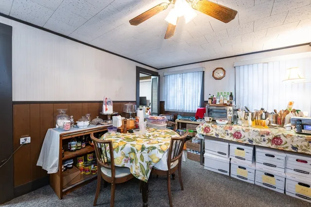 a view of a dining room with furniture