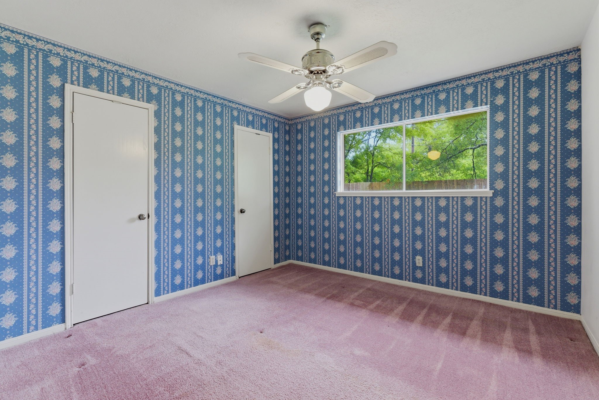 26503 Hillside Drive Spring, TX 77386 - Photo 16 of 22 a view of an empty room with a window