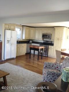 620 Gerard Avenue Long Branch, NJ 07740 - Photo 2 of 6 a room with furniture pool table and a window
